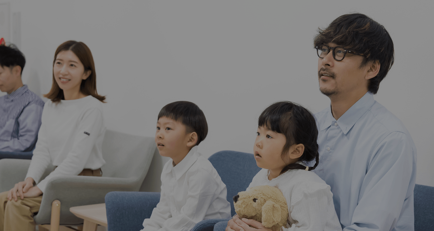 Family watching television together